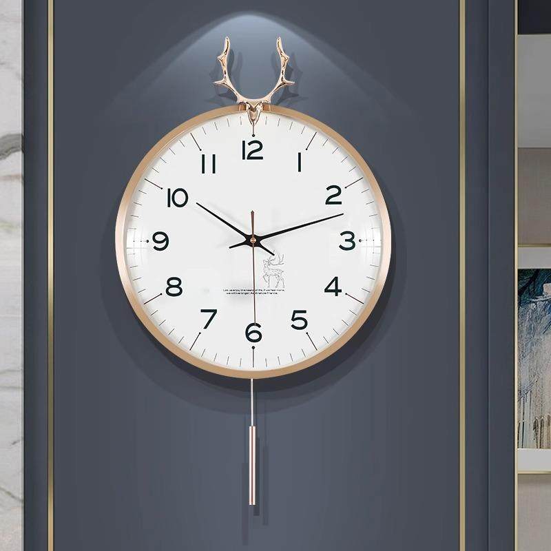 北欧轻奢鹿头客厅挂钟网红现代简约时钟表家用时尚大气挂墙挂式表