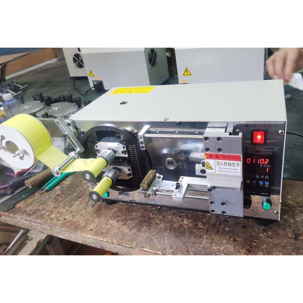 电机线圈自动包胶机电磁铁电机线圈自动包胶机醋酸胶布自动包胶机