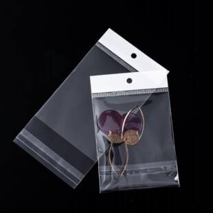 跑量现货透明塑料袋opp不干孔胶透明白自粘袋色挂孔257卡袋头吊袋