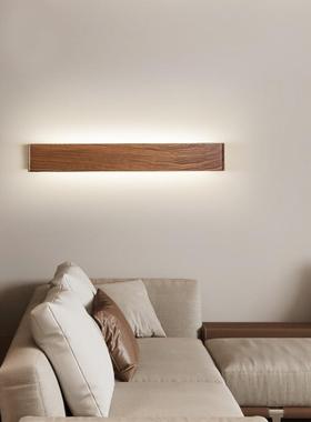 现代墙简约道黑胡条桃实木极简卧室床头壁灯北欧长背86479景温馨