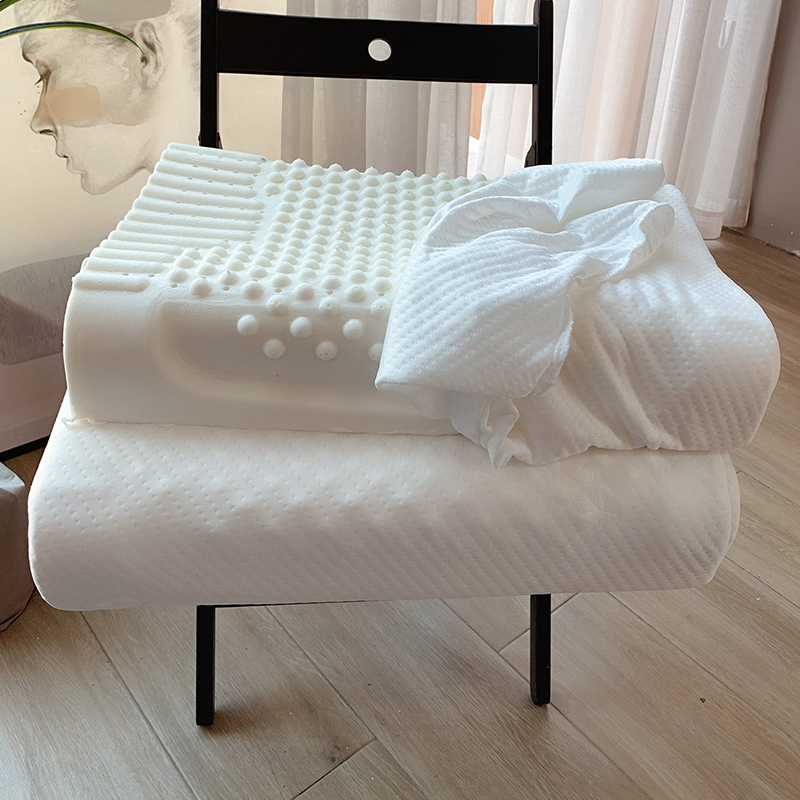 泰国天然乳胶枕头护颈椎助睡眠枕学生成人高低记忆枕按摩颗粒枕芯