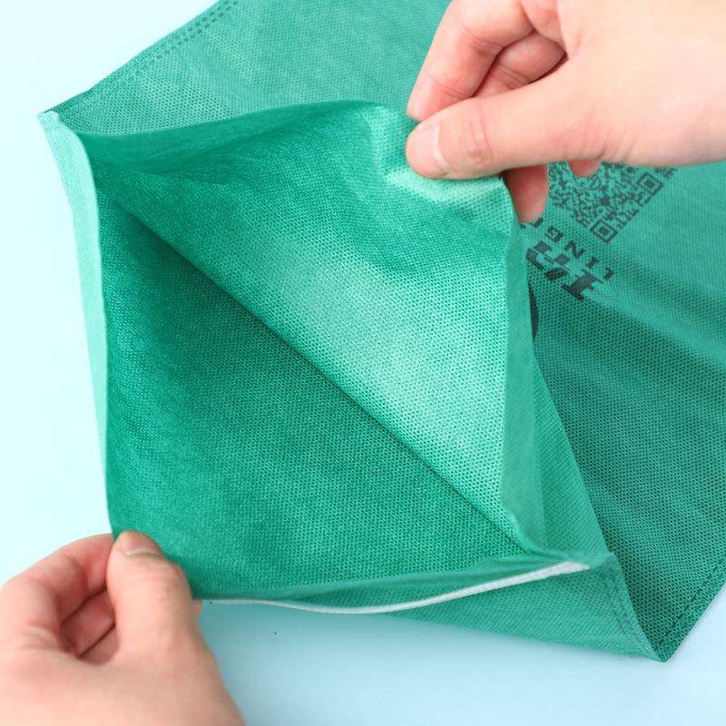 天无纺布葡萄套露铁扎口果林大丝棚透气防虫防AVU鸟瓜果保护套袋