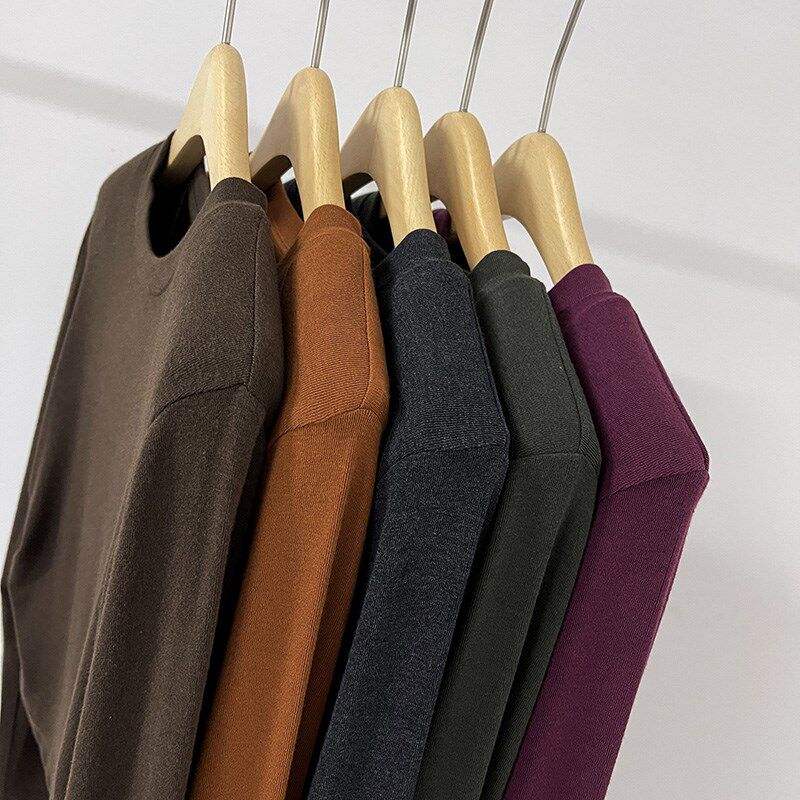 元熙6024圆弧褶皱收腰长袖打底衫女秋季新款高腰短款内搭垫肩上衣