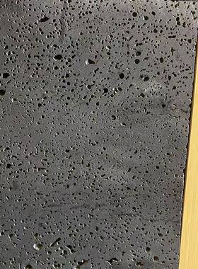 火山黑色洞石26852黑色灰洞石园林仿古铺地石石墙面孔多蜂窝石板