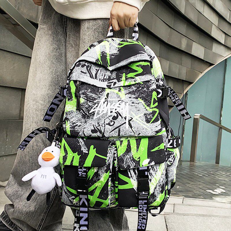 港风休闲迷彩大容量双肩包男新款潮牌初中生高中学生书包男生背包