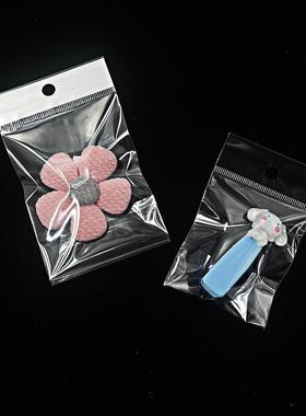 现货加厚opp不干胶透袋自粘白色卡挂头明袋吊848孔服装包装袋孔袋