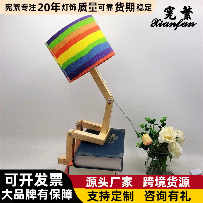 跨境创意机器人折叠卧室客房书桌装饰台灯木质布艺可变造型个性灯