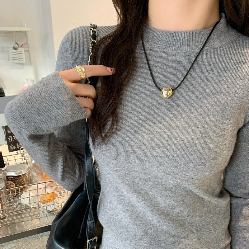 白色针织打底衫女内搭2025春秋季新款高级感圆领毛衣外搭修身上衣