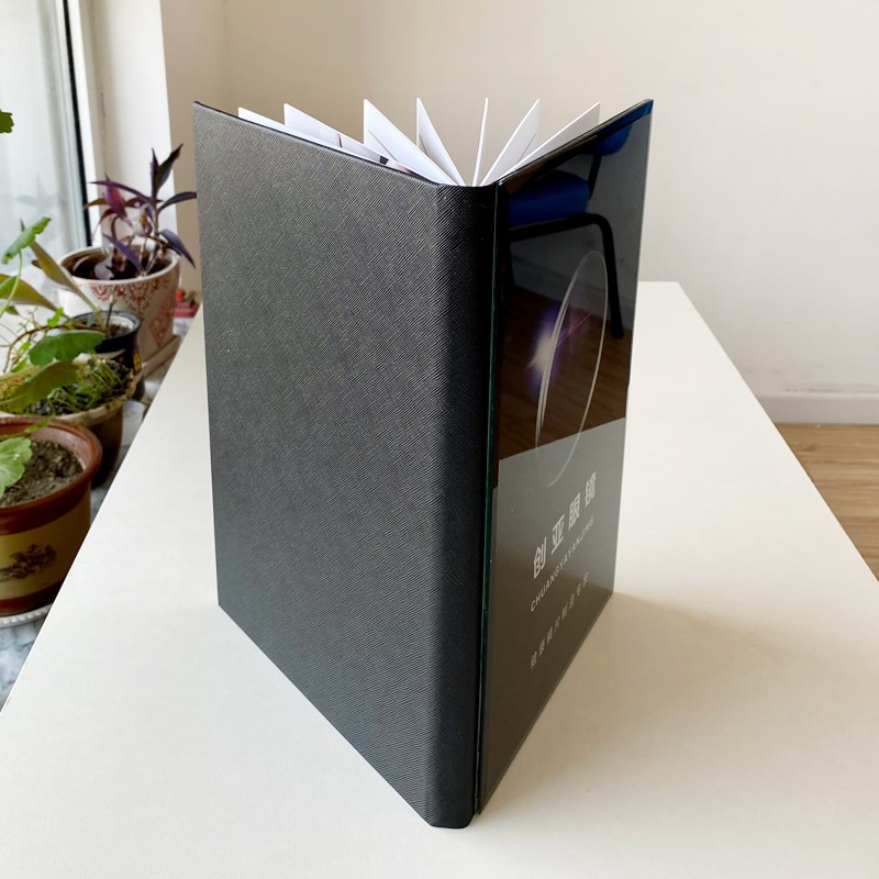 亨得利眼镜店水晶价目册本定制视力养护矫正价格表大光明项目手册