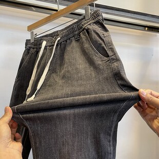 薄款弹力夏季烟灰色松紧腰修身小脚九分裤百搭休闲抽绳牛仔裤子男
