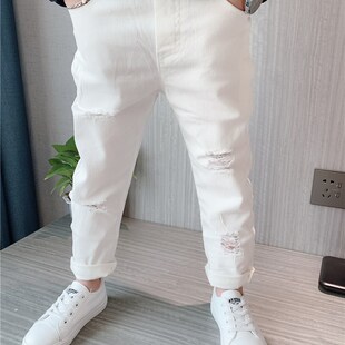 男童黑色破洞白色牛仔裤儿童弹力修身春秋款2023新款宝宝小脚裤子