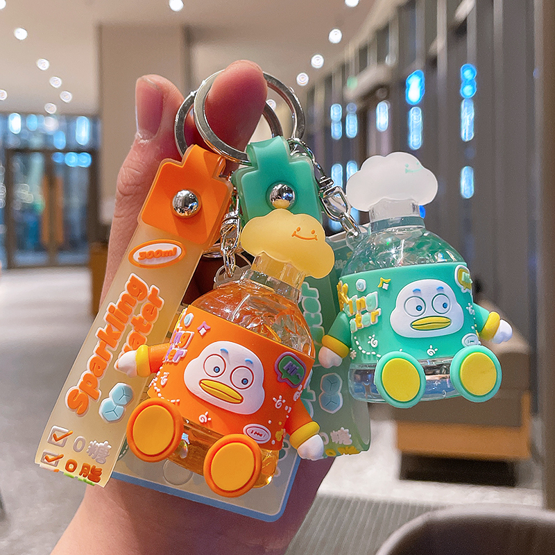 创意入油咕噜鸭气泡水钥匙扣可爱解压流沙书包挂饰加油鸭情侣礼物