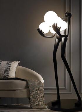 人形术雕塑抱球地灯QLN设计师酒店大堂落展厅创意大型人艺体落地