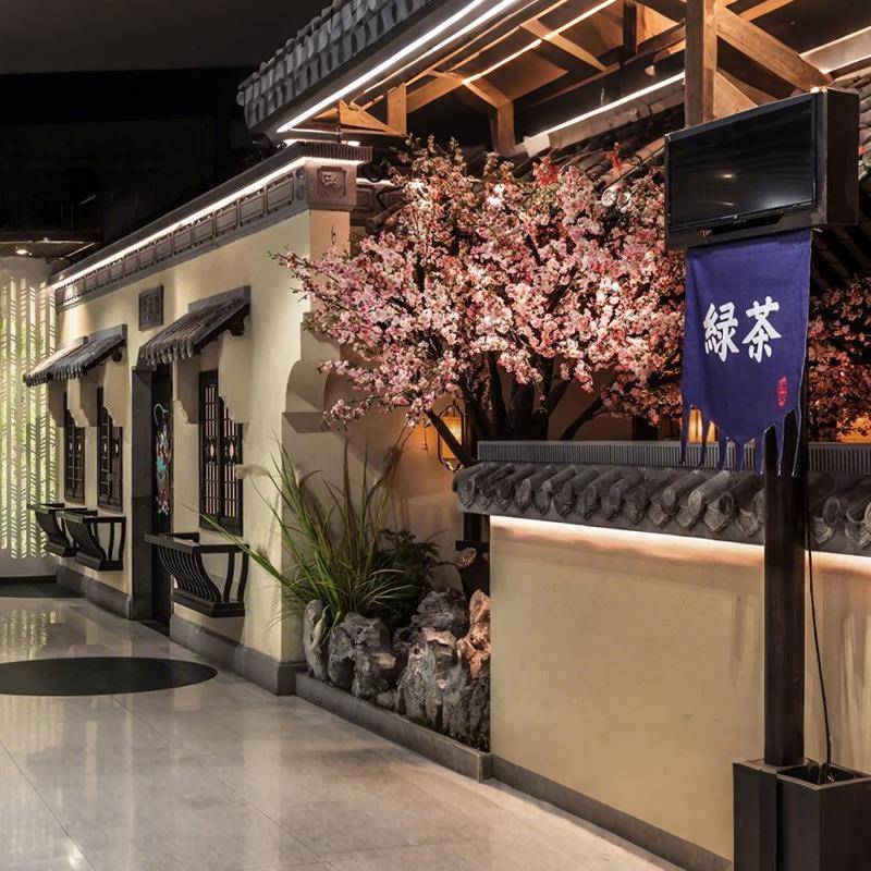 观绿茶中餐厅大型仿真桃花IKR树景造间景室商业空内装饰软装美陈
