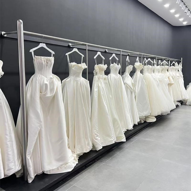 不锈钢婚纱架子拉丝银壁挂衣杆悬挂吊架上墙礼服挂架靠墙落地定制
