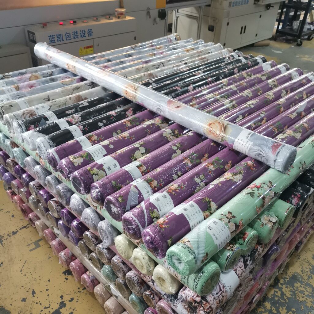 绍兴柯桥安昌袍江钱清全自动布匹包装机布卷面料自动热收缩包装机
