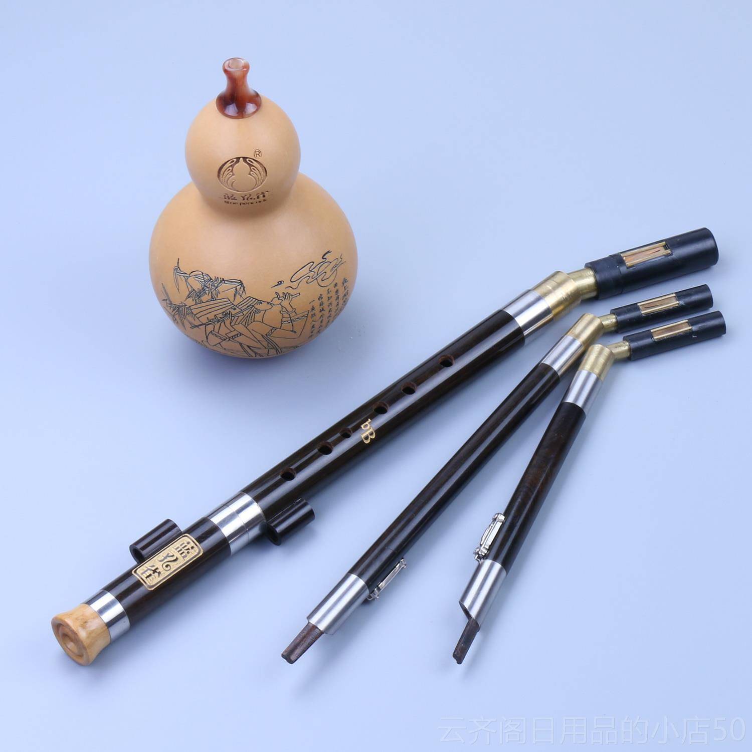 正品蓝孔雀牌 专业演奏 C调降B调黑檀品木葫芦丝 7孔云 南乐器管