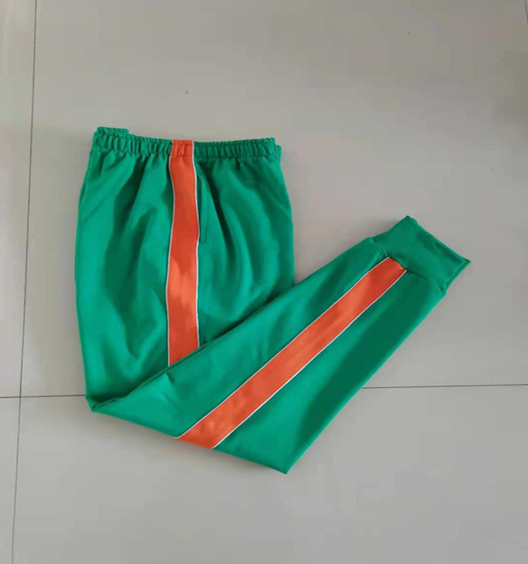 中小学生新款春秋绿色休闲裤拼接橘底两道细白杠宽松直筒运动校裤