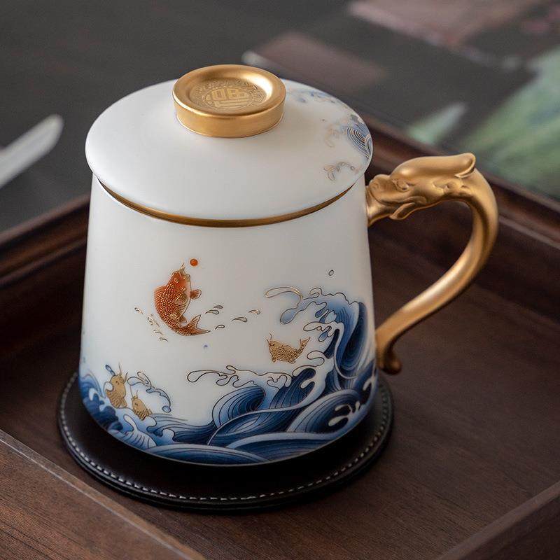 哲选鱼跃龙门茶水分离泡茶杯贴花德化羊脂玉瓷茶漏送礼
