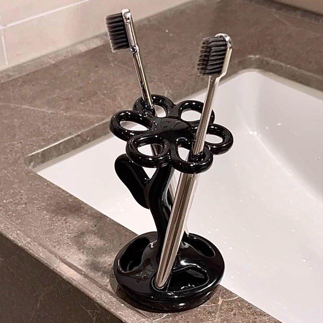 花朵创意牙刷收纳架轻奢高级感卫生间浴室台放电动牙刷底座置物架