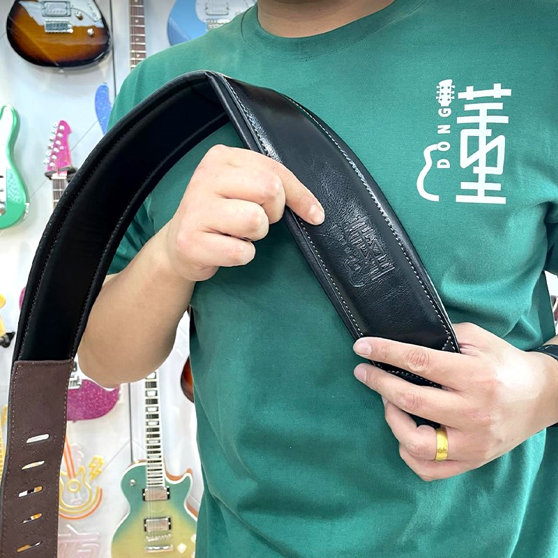 【懂】超厚牛皮吉他背带配件民谣贝斯电木吉他加厚琴带肩带斜挎
