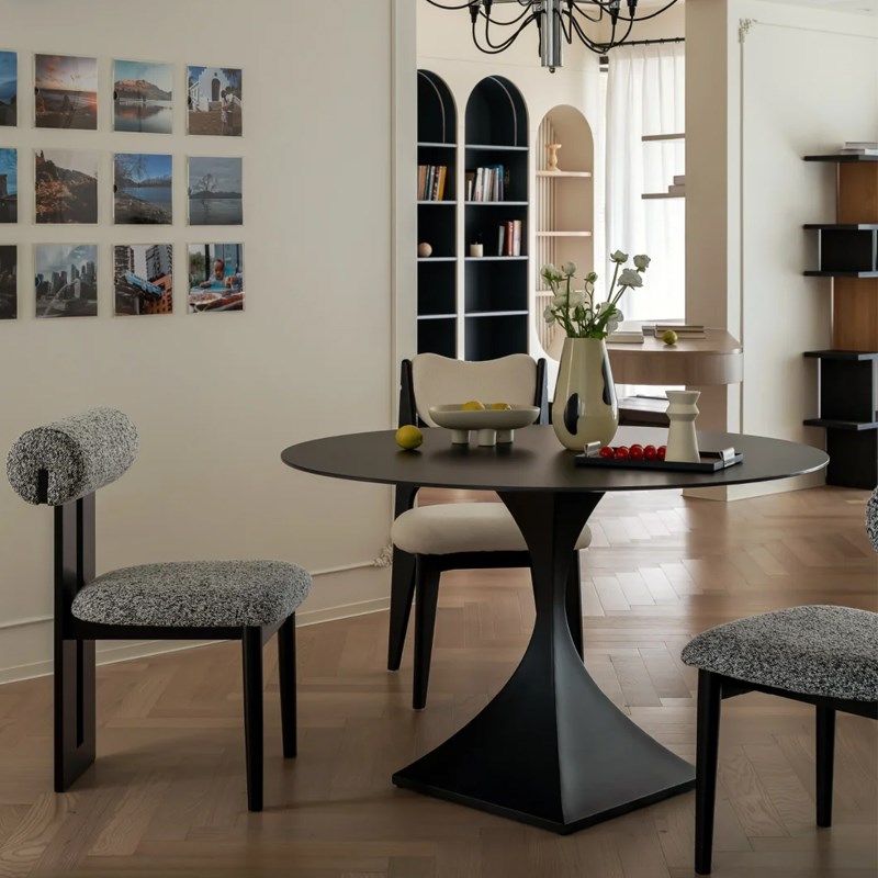 意式极简德利丰岩板圆形餐桌家用小户型纯黑色圆桌设计师饭桌异形