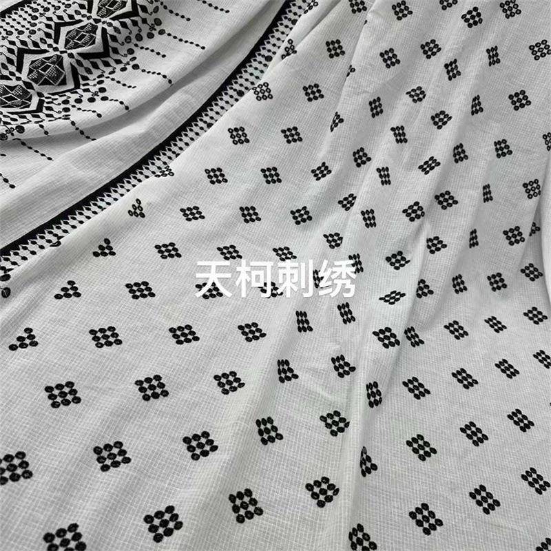 全棉打装绣花面料西波米亚风格连E9428衣裙长裙服绣花孔布料单边