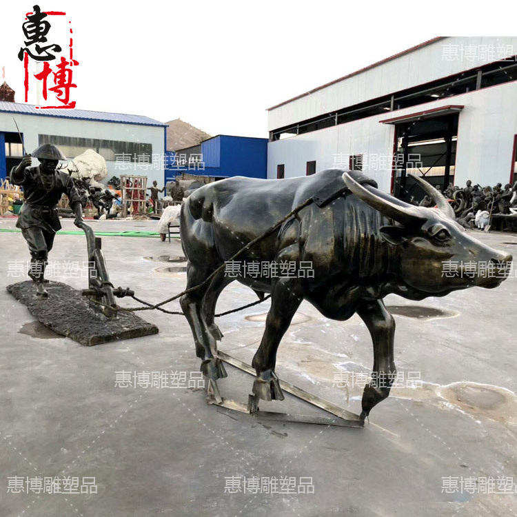 玻璃钢铸铜牛拉犁文化主题雕塑