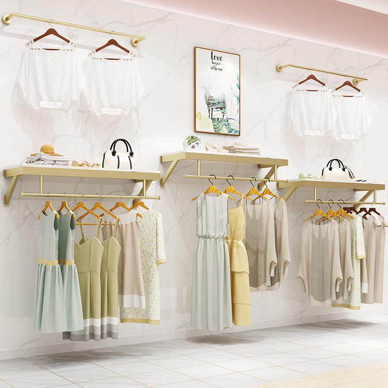 男女服装店上墙挂衣架 壁挂式服装展示架童装店墙壁装修金色货架