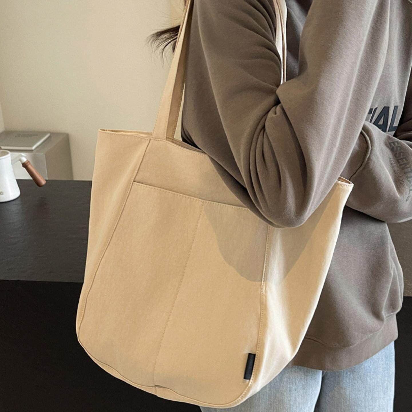 帆布大包包女新款大学生上课书包通勤托特包休闲大容量单肩包