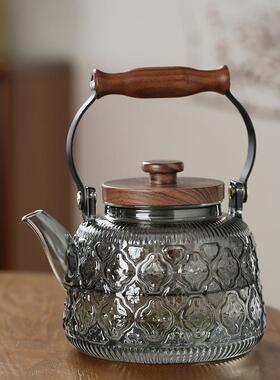 新款烟灰色玻璃提梁壶家用高硼硅玻璃蒸煮一体海棠透黑提梁壶