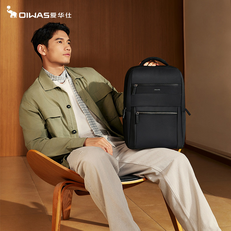 爱华仕都市风范男士双肩书包日常通勤电脑包商务背包旅行黑色背包