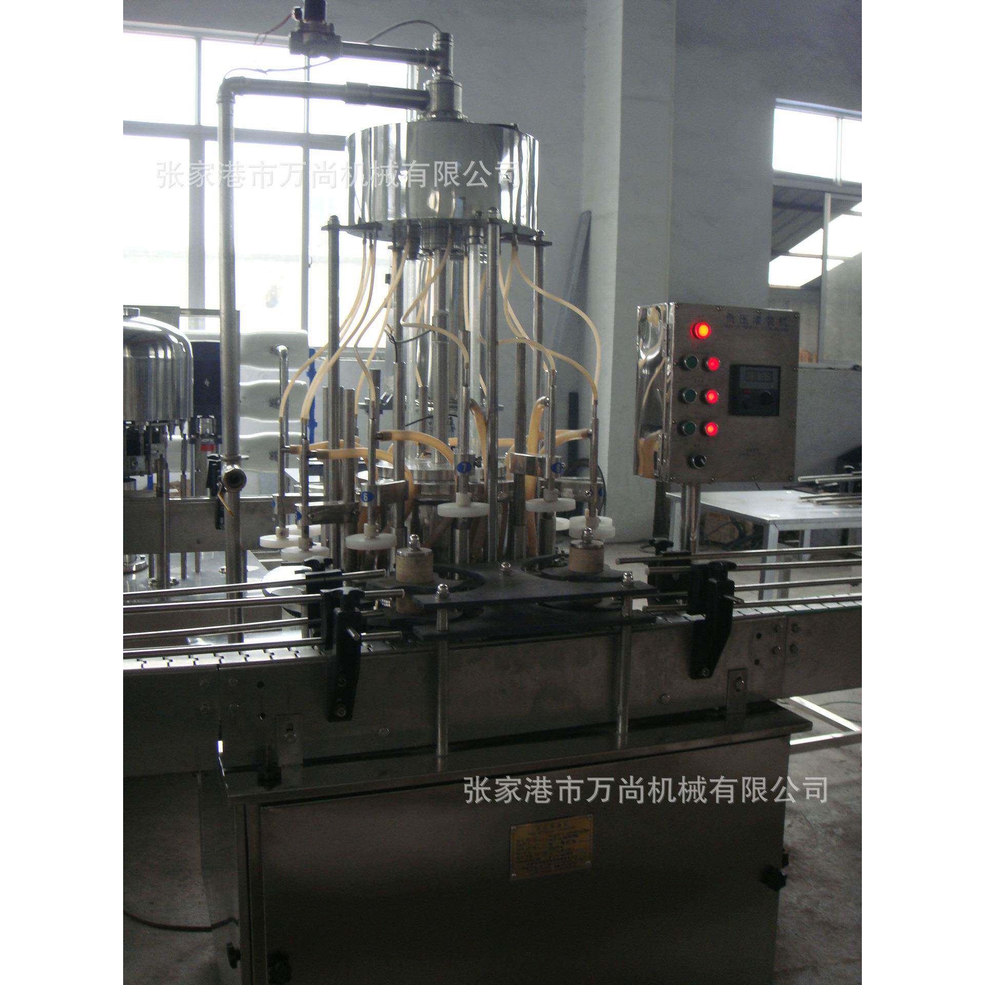 厂家供应12头玻璃瓶负压灌装机，葡萄酒灌装机，酒类灌装机