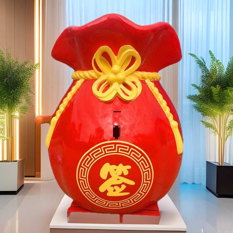 2025新年装饰卡通钱袋福袋玻璃钢雕塑商场售楼处店铺美陈落地摆件