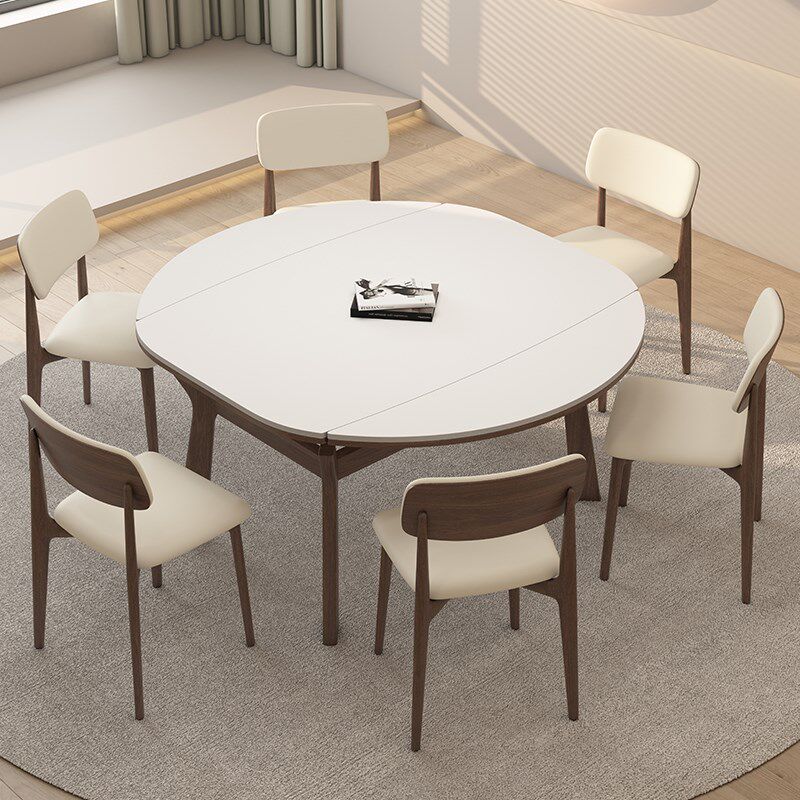 实木可伸缩岩板餐桌可变圆桌家用小户型侘寂中古风高端原木饭桌子