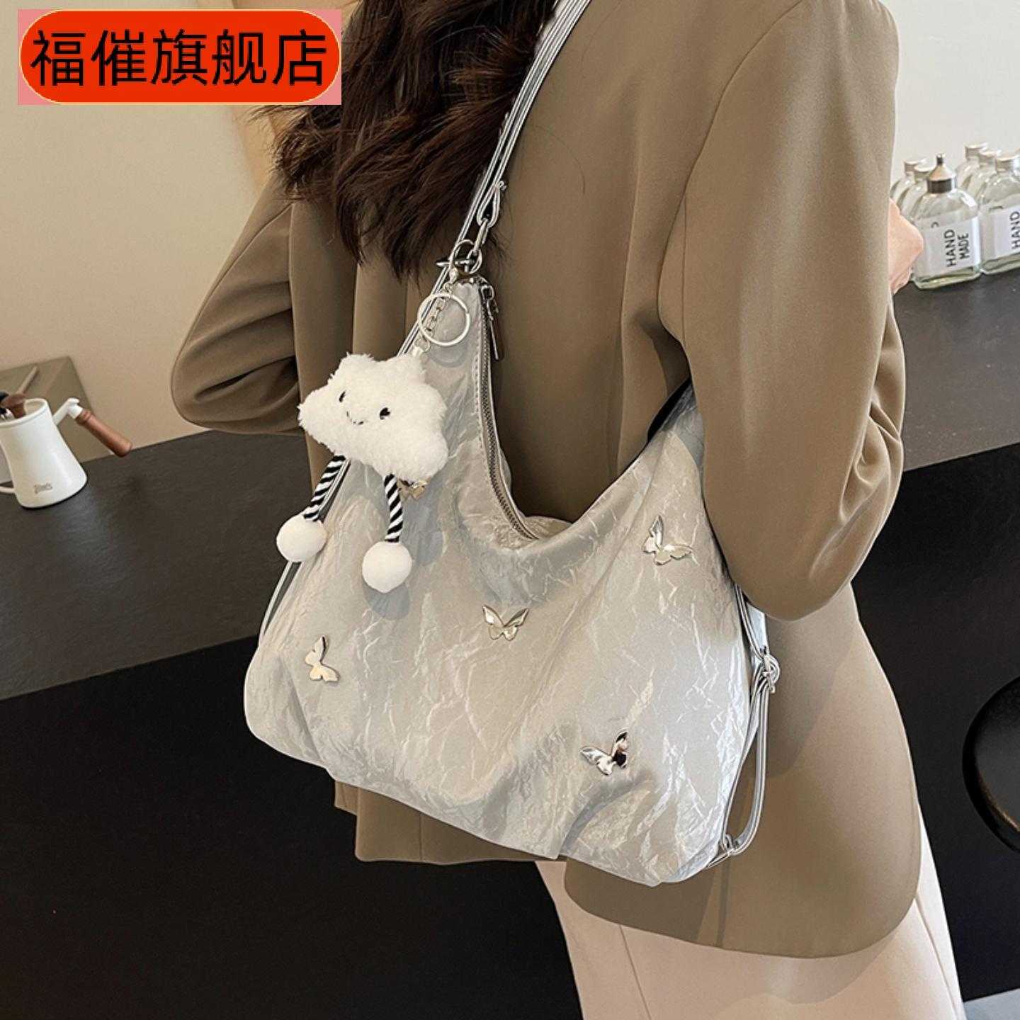 大容量春夏女款通勤双肩水桶多