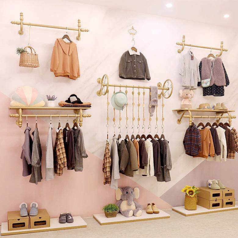 童装店展示架简约壁挂式金色陈列架组合上墙铁艺挂衣架服装店货架