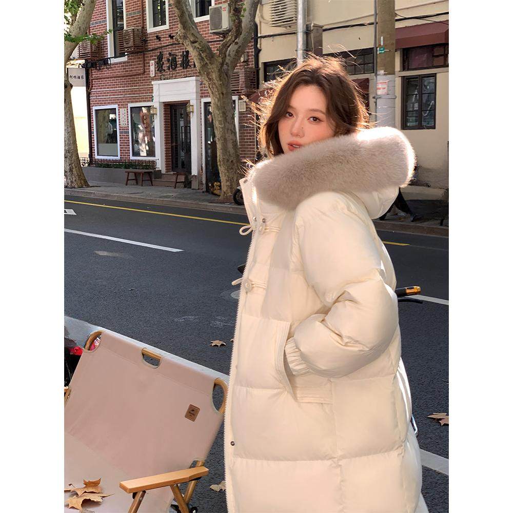 白鸭绒粉色高级感羽绒服女中长款冬季2025新款a字版宽松轻薄保暖