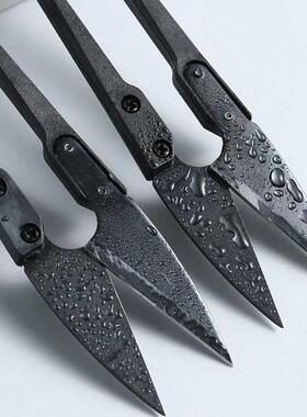 Small sharp steel scissors, handcrafted with a spring mechan