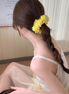 The bloggers matching flower-back-of-the-head style, featur