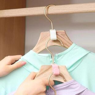 Clothes hanger connecting hook for wardrobe space-saving sto