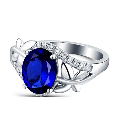 Popular egg-shaped diamond ring inlaid with blue crystal zir