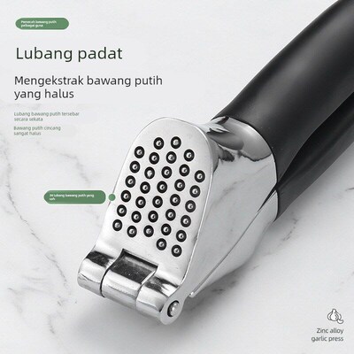 Zinc alloy manual garlic press, thickened for household use.