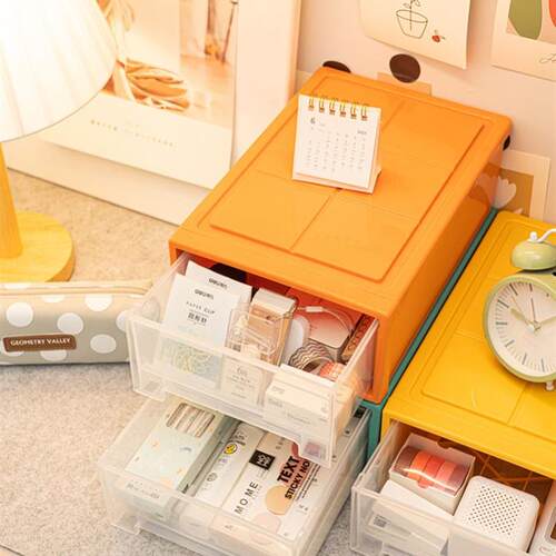 Plastic see-through storage boxes for clothes and snacks