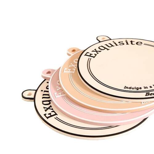 Cream-colored placemats and heat-insulating pads, designed t