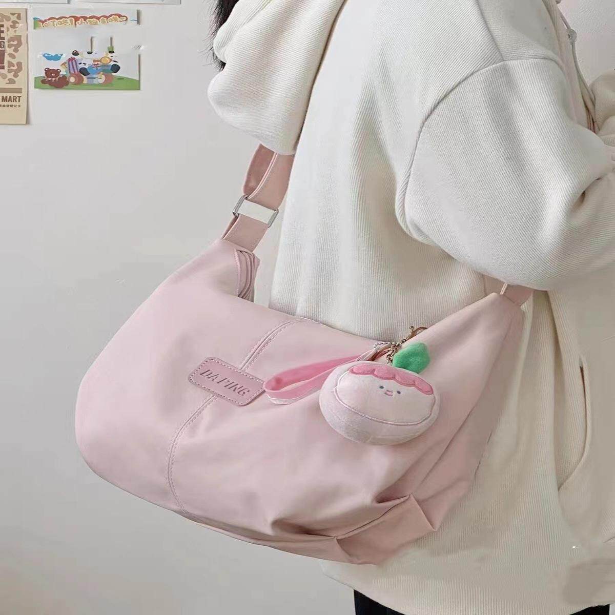 日系ins单肩包女简约百搭休闲大容量饺子包大学生上课通勤斜挎包