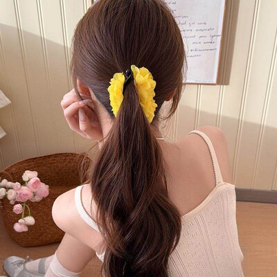 The bloggers matching flower-back-of-the-head style, featur