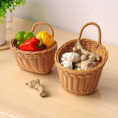 Wicker-style storage basket for ginger and garlic, a kitchen
