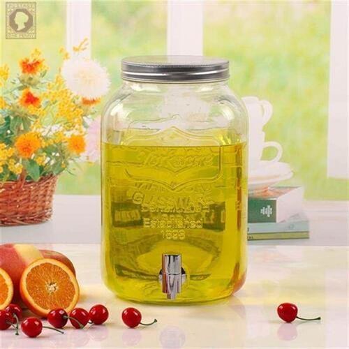 The glass jug bucket with tap water dispenser glass juice