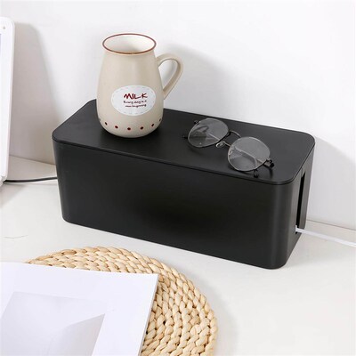 Cable management box for power strips and sockets, a desktop